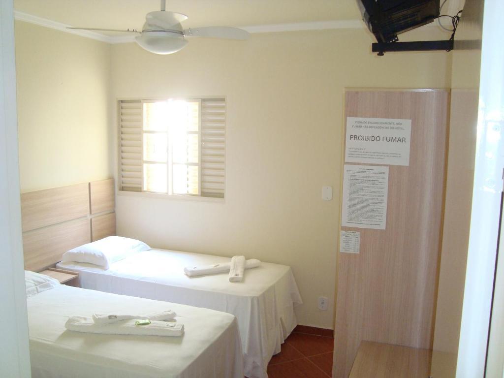 Hotel Perez Pouso Alegre Room photo